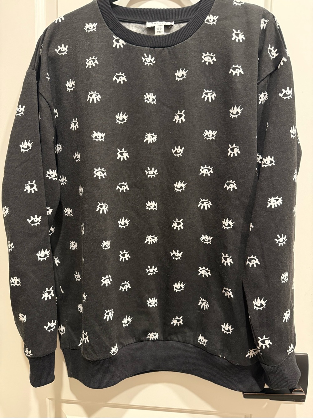 Black Graphic Crewneck Sweater with White Eye Print